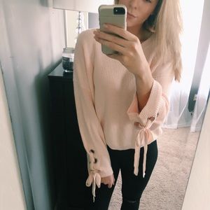 Lace up sleeve sweater